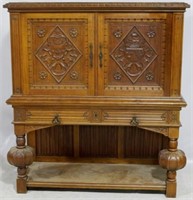 English Jacobean carved oak cabinet