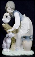 Lladro girl with dog figurine, 8.5"