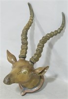 Carved wood ridged antelope trophy head
