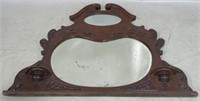 Decoratively carved mirror, 42.5 x 50