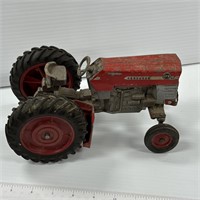Vintage tractor toy with rubber wheels