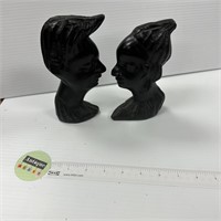 Wooden pair of head sculptures