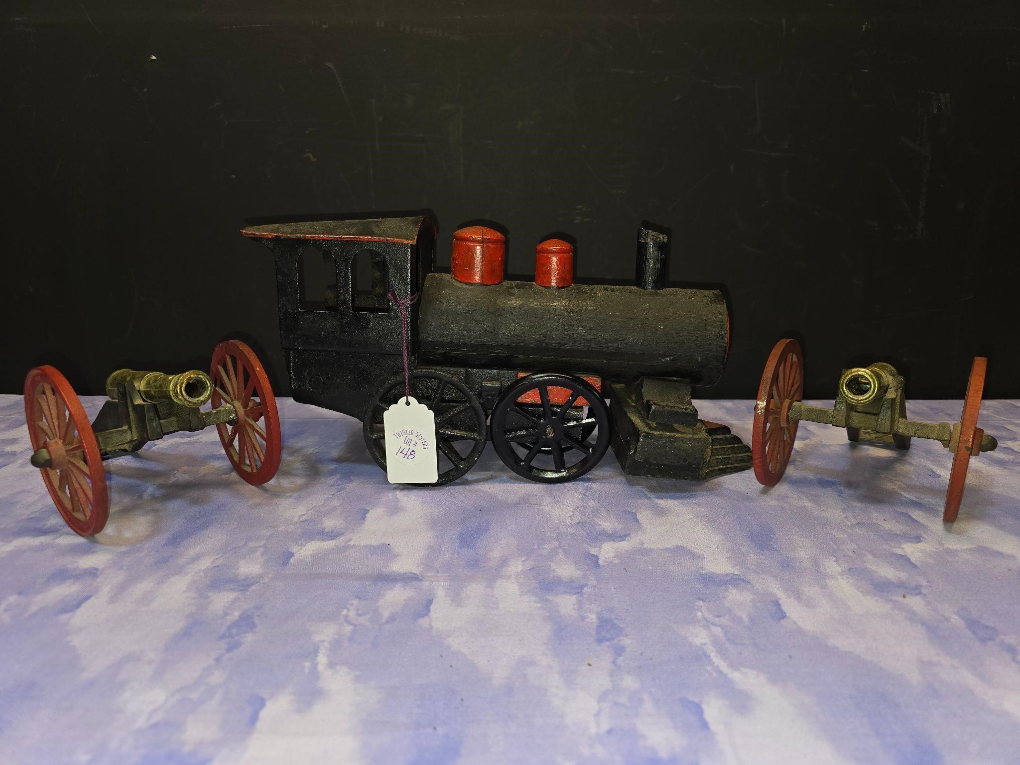 Vintage wooden train engine and die cast cannons