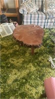 Three legged wood slab coffee table