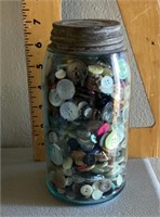 Mason jar full of buttons