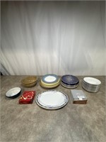Assortment of serving bowls and platters, variety