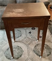 Sewing cabinet on porcelain casters