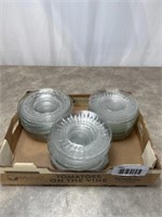Large assortment of clear glass salad plates