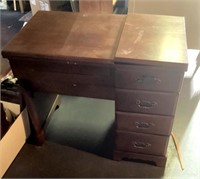 Sewing machine cabinet