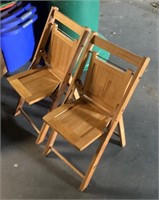2 children’s wooden folding chairs