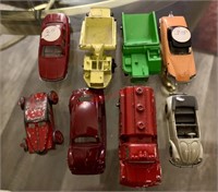 8 Vintage Toy Cars (back room)