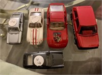 5 Vintage Toy Cars (back room)
