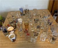 LOT. OF 50+ SHOT GLASSES, ALL IN NEW CONDITION
