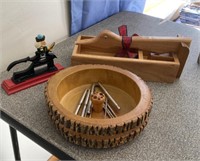 TWO NUTCRACKERS AND A NUT BOWL