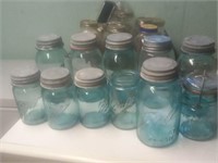 ELEVEN ANTIQUE BLUE BALL MASON JARS