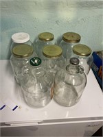 SIX GALLON JARS AND TWO GALLON JUGS