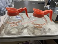 Two decaf commercial carafes