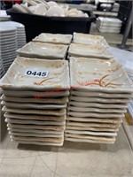 Large lot of white plastic sauce trays