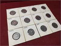 (12) 1975-1985 MIX DATE CANADA NICKELS 5 CENTS