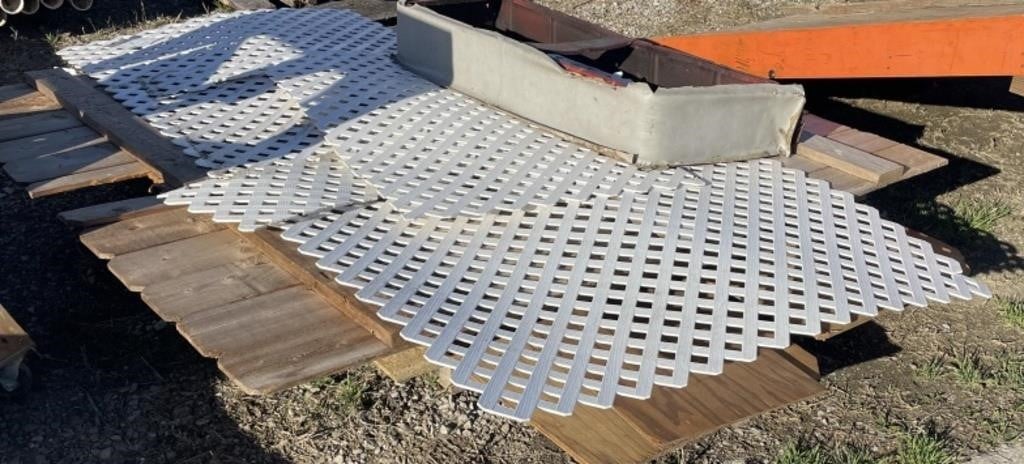 Pallet of Plywood and White Garden Fence