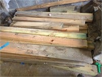 pile of approximately 4 ft pieces of wood