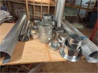 assorted 6-8" stove pipe and fittings.