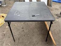 BLACK CARD TABLE - DAMAGE SHOWN ON TOP