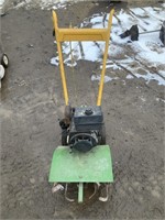 Green and yellow rototiller