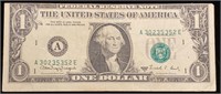 Irregular cut off $1 bill