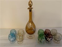 Painted Amber decanter with 10 matching brandy