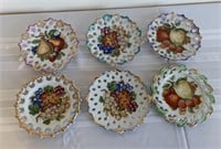 6- 7" fruit themed plates with gold trim and