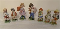 7 Child figurines - matching