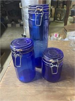 3 Cobalt blue canisters with wire lock 13" , 8"