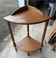 Corner table with shelf