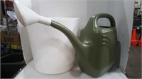 Self-watering pot and watering can