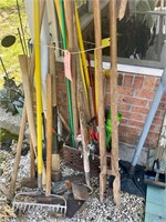 Assorted rakes yard tools etc