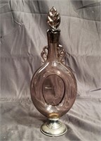 Blown glass decanter with silver plate base