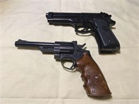 2 plastic movie prop guns (pb)