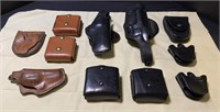Leather gun and handcuff holsters (f)