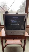 Sylvania box tv powers on  VHS AND DVD player