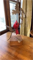 Wood base with metal branch and cardinal figure