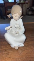 Porcelain Lladro girl feeding her lamb figure