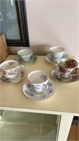 Lot of decorative tea cups and saucers
