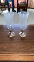 Weighted sterling candle stick holders with glass