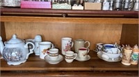 Shelf of miscellaneous decorative dishes and more