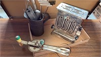 Vintage toaster and kitchen utensils