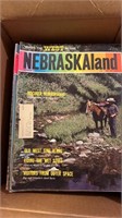 Vintage box of Nebraska land magazines