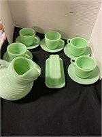 Jade cups, saucers, butter dish, and pitcher