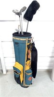 Golf bag with clubs yellow