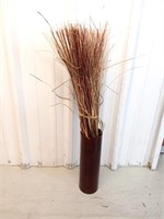 Large red vase with dried florals